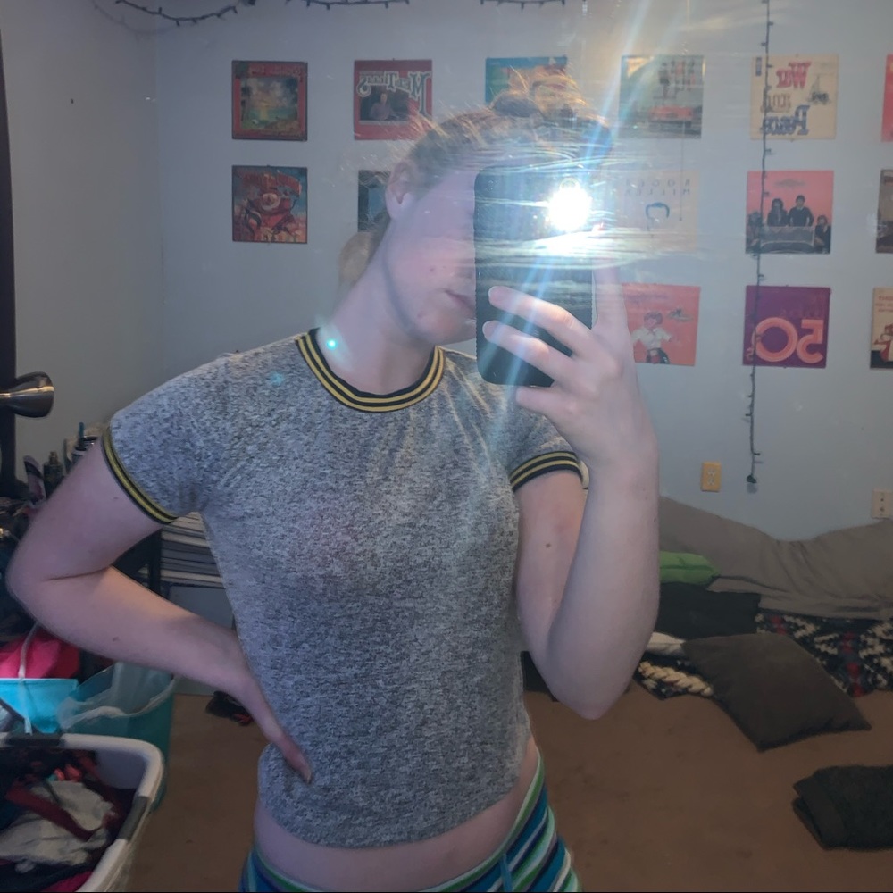 Grey shirt with yellow and black cuffs